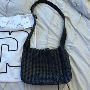 Paco Rabanne coin bag. Black leather.